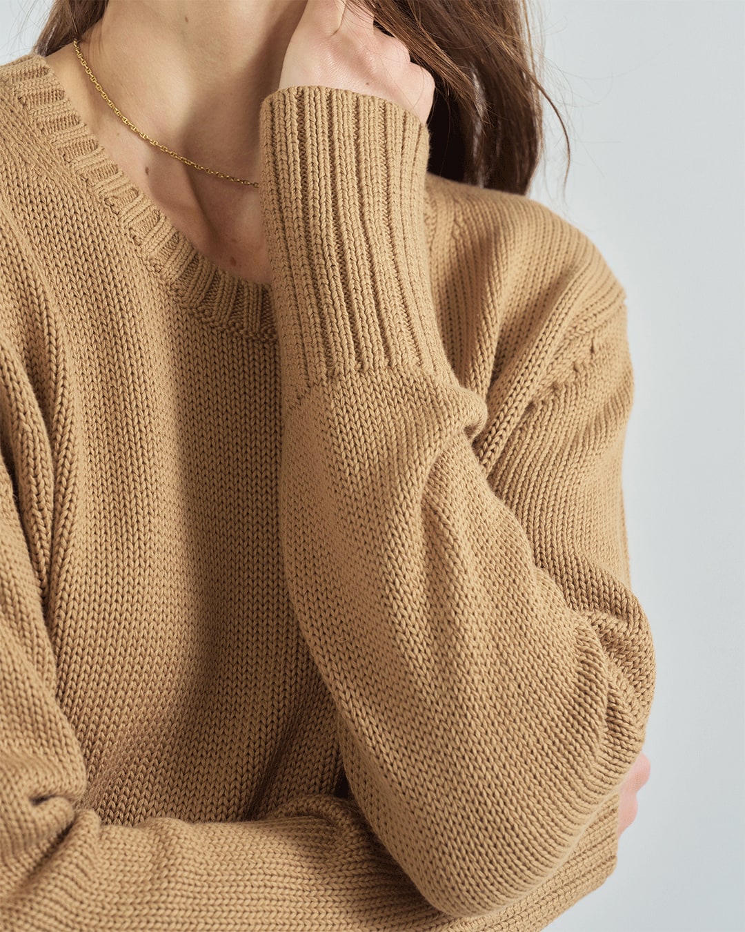 Detail shot of The Addison Cotton Crewneck Sweater in toffee — Turkish cotton