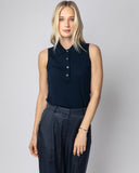 Woman wearing The Ainsley Sleeveless Cotton Polo in navy — State of Cotton NYC