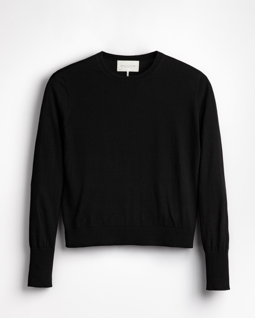 The Baldwin Cotton Sweater in navy, flat lay — State of Cotton NYC