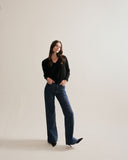 The Claremont Cotton V-Neck Sweater in black, mood shot — State of Cotton NYC