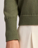 Detail shot of The Dorien V-Neck Cotton Sweater in cypress, sleeve cuff