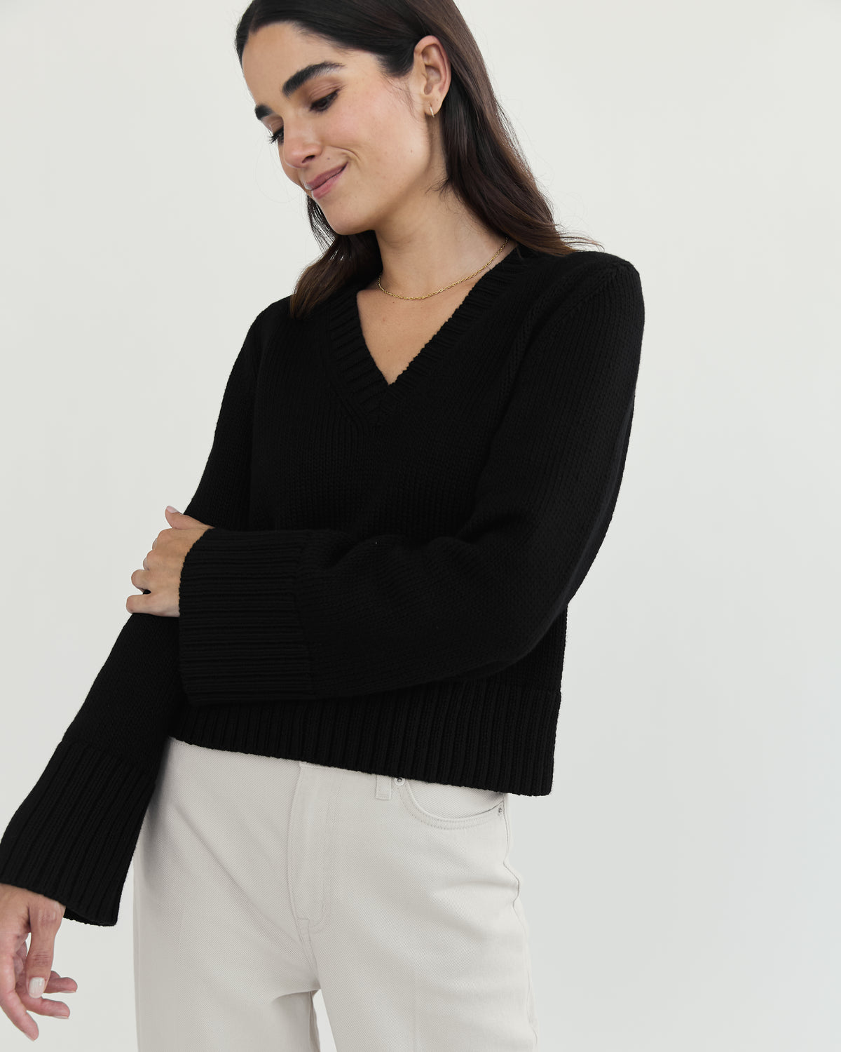 Detail shot of The Easton Cotton V-Neck Sweater in black — Turkish cotton