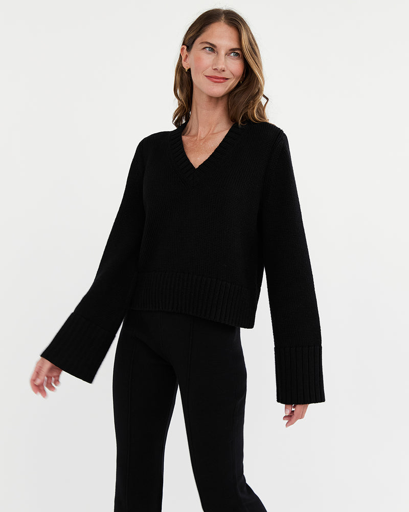 Woman wearing The Easton Cotton V-Neck Sweater in black — State of Cotton NYC