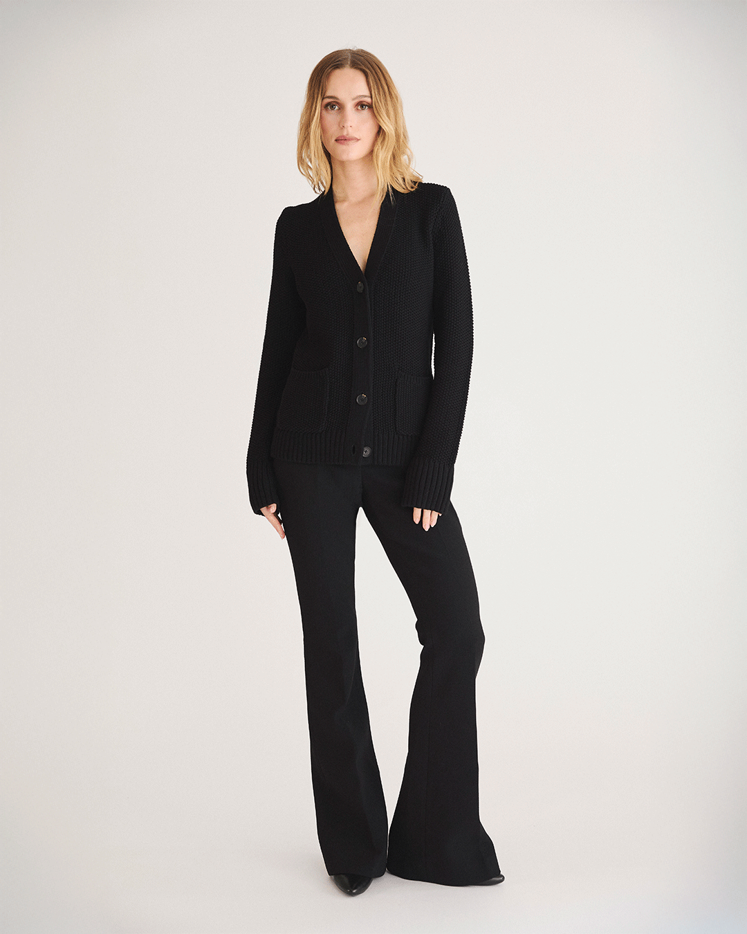 The Griffin Seed Stitch Cotton Cardigan in black, styled view — State of Cotton NYC