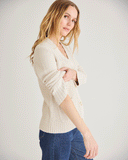 Woman wearing The Griffin Seed Stitch Cotton Cardigan in ivory — State of Cotton NYC