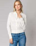 Detail shot of The Halsey Cotton Polo Sweater in ivory — Egyptian cotton, Italian-spun