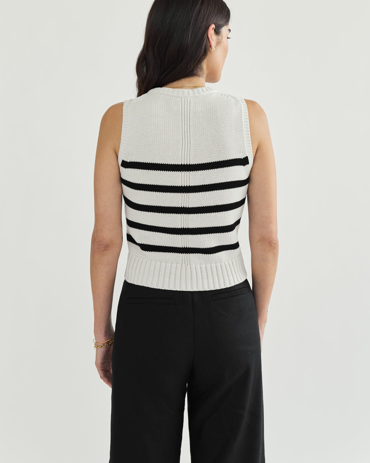 Detail shot of The Hayden Stripe Sleeveless Sweater in ivory and black — Turkish cotton