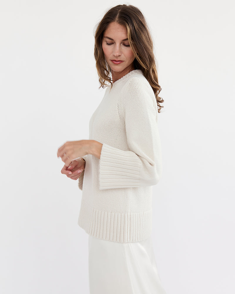 Detail shot of The Kittery Cotton Bell Sleeve Sweater in ivory — Italian-spun Turkish cotton