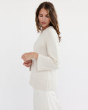 Detail shot of The Kittery Cotton Bell Sleeve Sweater in ivory — Italian-spun Turkish cotton