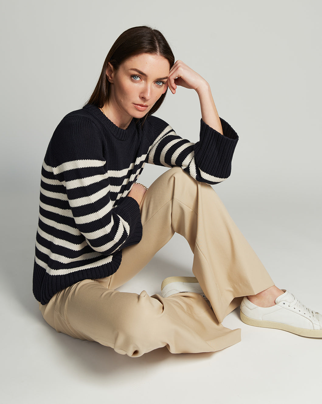 Woman wearing The Kittery Stripe Cotton Bell Sleeve Sweater in navy and ivory — State of Cotton NYC
