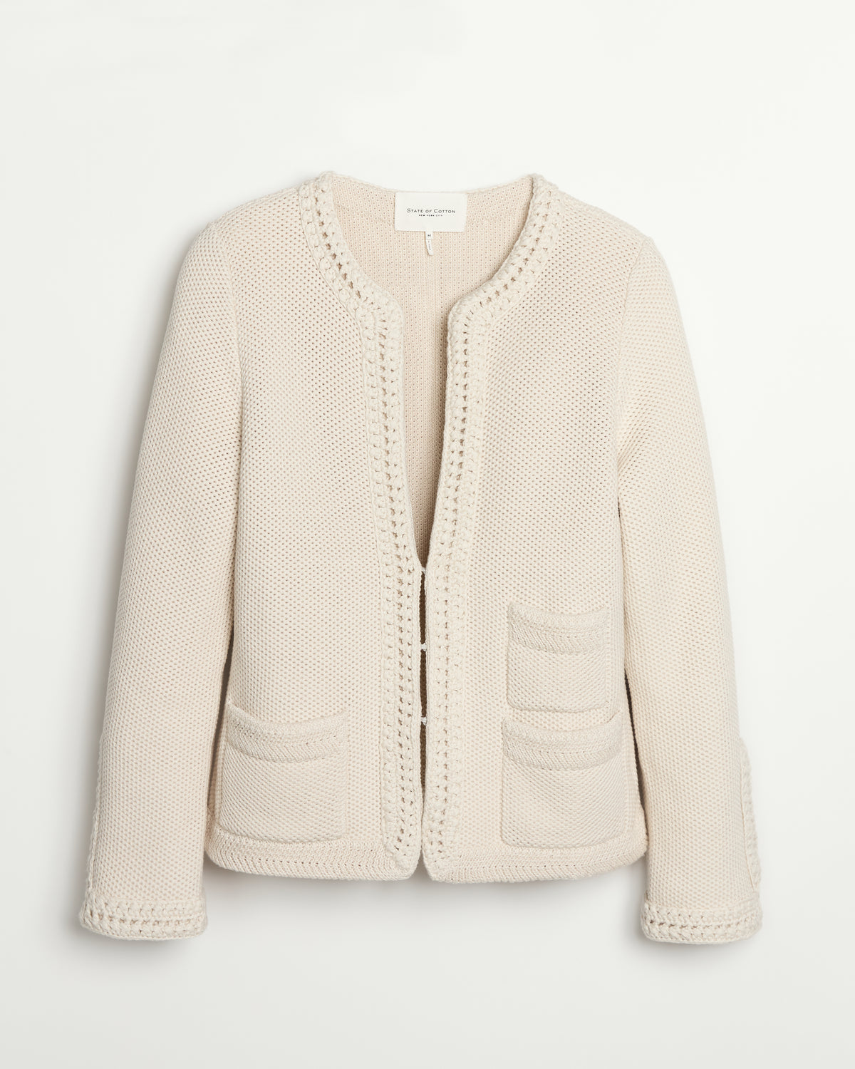 Detail shot of The Merion Cotton Cardigan in ivory — Turkish cotton