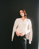 Detail shot of The Perry Cotton Cardigan in ivory — lightweight Egyptian cotton, Italian-spun