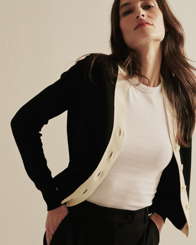 Detail shot of The Perry Tipped Cotton Cardigan in black — Egyptian cotton, Italian-spun