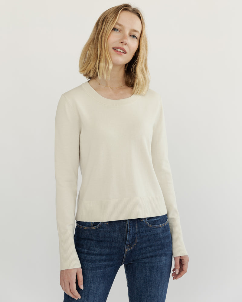 Detail shot of The Sinclair Cotton Crewneck Sweater in ivory — lightweight cotton