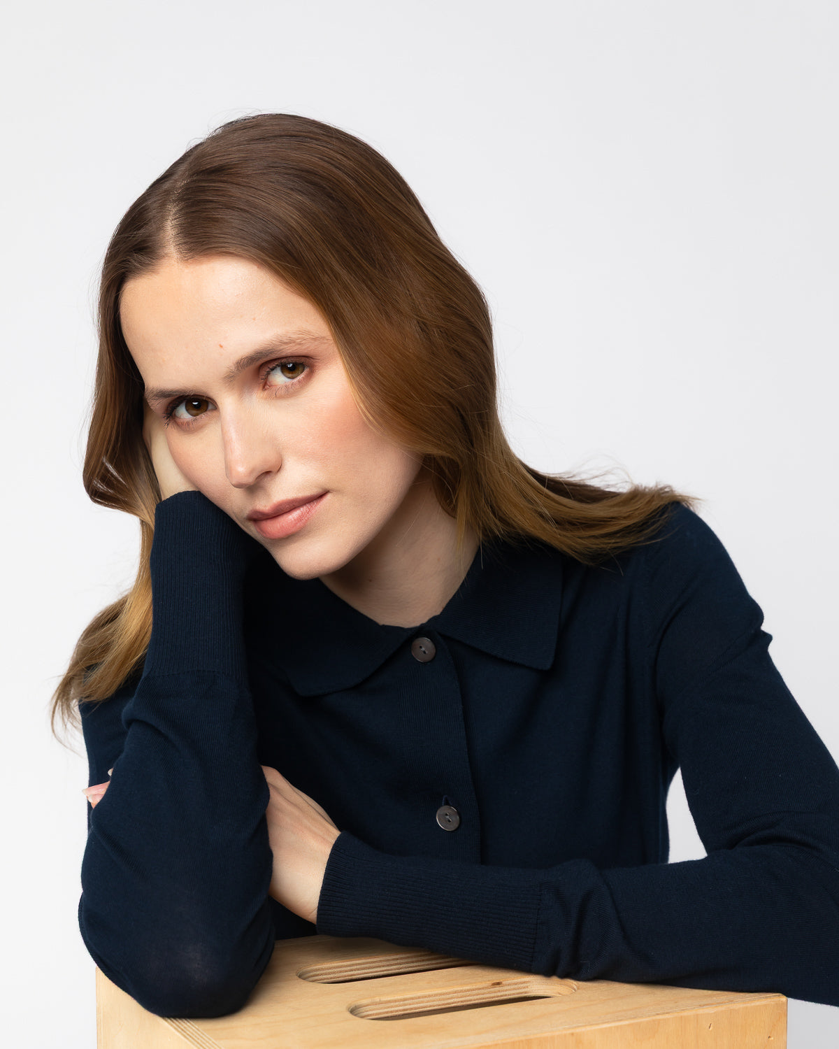 The Halsey Cotton Polo Sweater in navy, lifestyle view — State of Cotton NYC