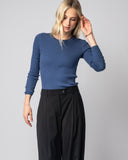 The Surrey Cotton Crewneck Sweater in ivory, lifestyle view — State of Cotton NYC