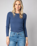 Woman wearing The Surrey Cotton Crewneck Sweater in ivory — State of Cotton NYC