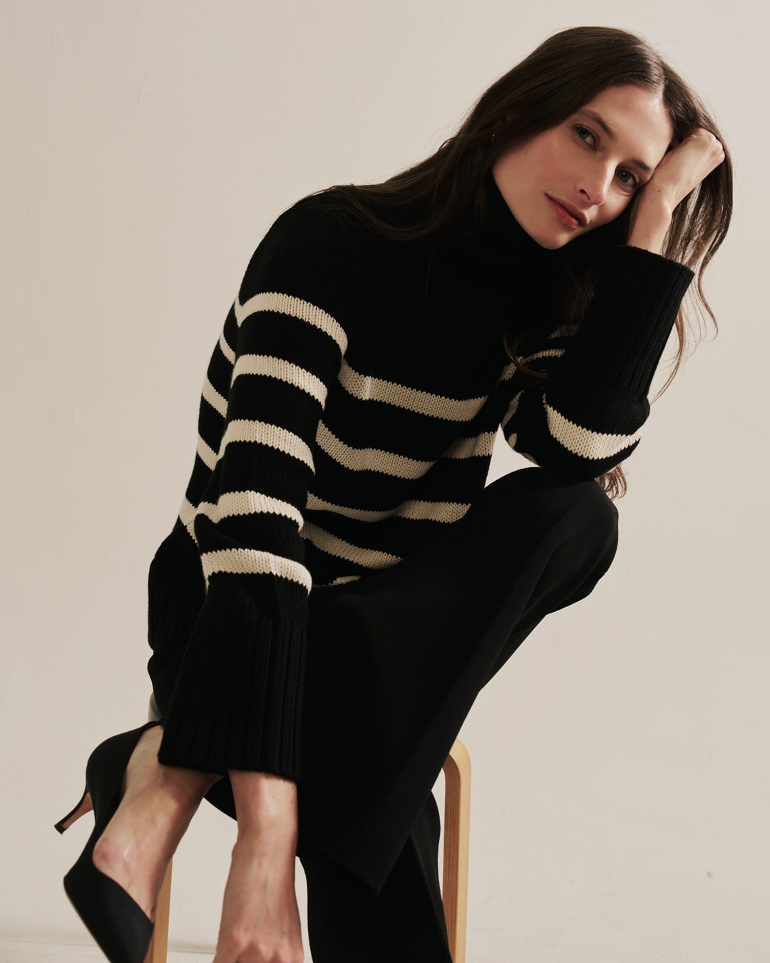 Detail shot of The Wynn Stripe Cotton Turtleneck Sweater in black — Turkish cotton