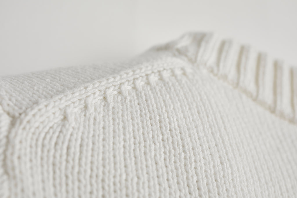 Detail shot of The Castine Cotton Crewneck Sweater in ivory — Turkish cotton, Italian-spun