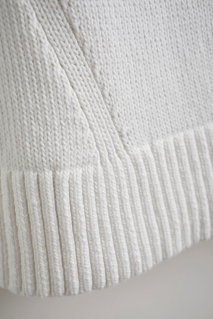 Detail shot of The Castine Cotton Crewneck Sweater in white — Turkish cotton, Italian-spun