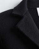 Detail shot of The Beale Cotton Cardigan Blazer in black — organic American cotton, Italian-spun