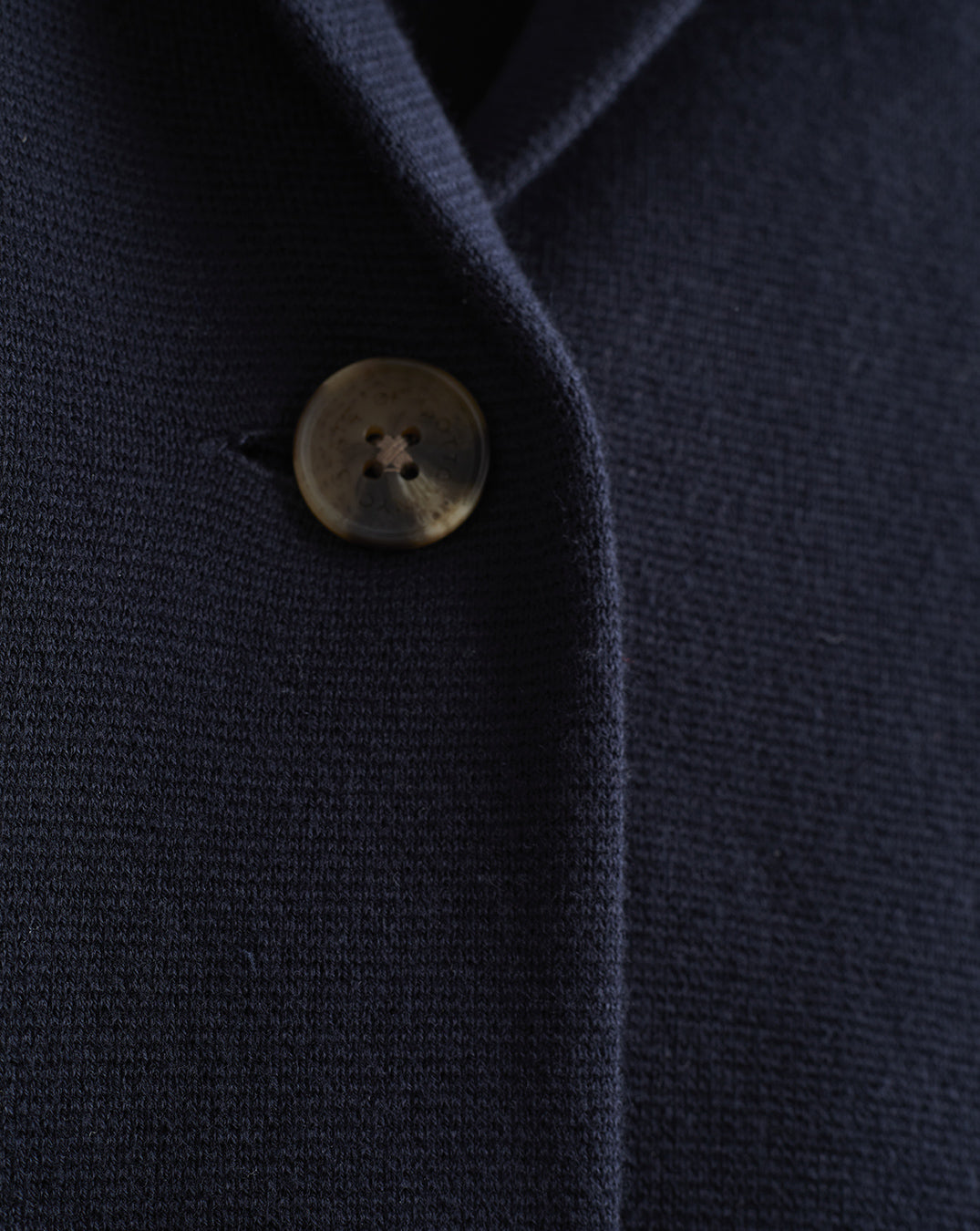 Detail shot of The Beale Cotton Cardigan Blazer in navy — organic American cotton