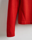 Detail shot of The Devon Cotton Crewneck Sweater in red — lightweight Egyptian cotton