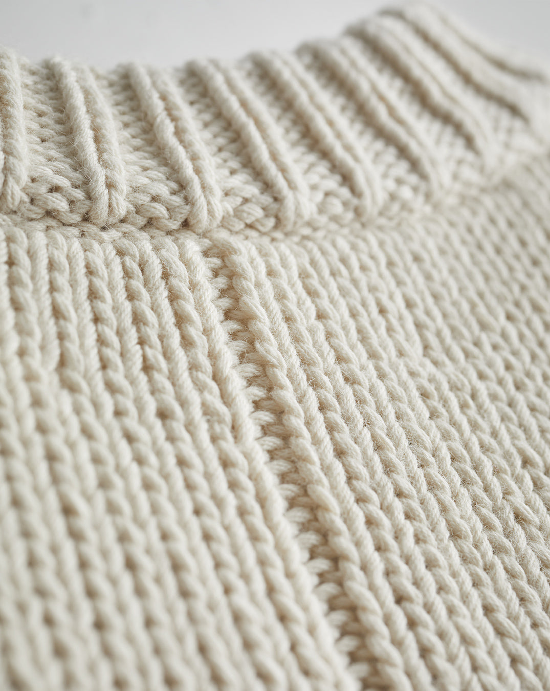 Detail shot of The Kittery Cotton Bell Sleeve Sweater in ivory — Italian-spun Turkish cotton