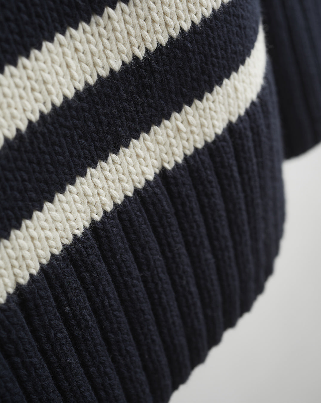 Detail shot of The Kittery Stripe Cotton Bell Sleeve Sweater in ivory and navy — Turkish cotton