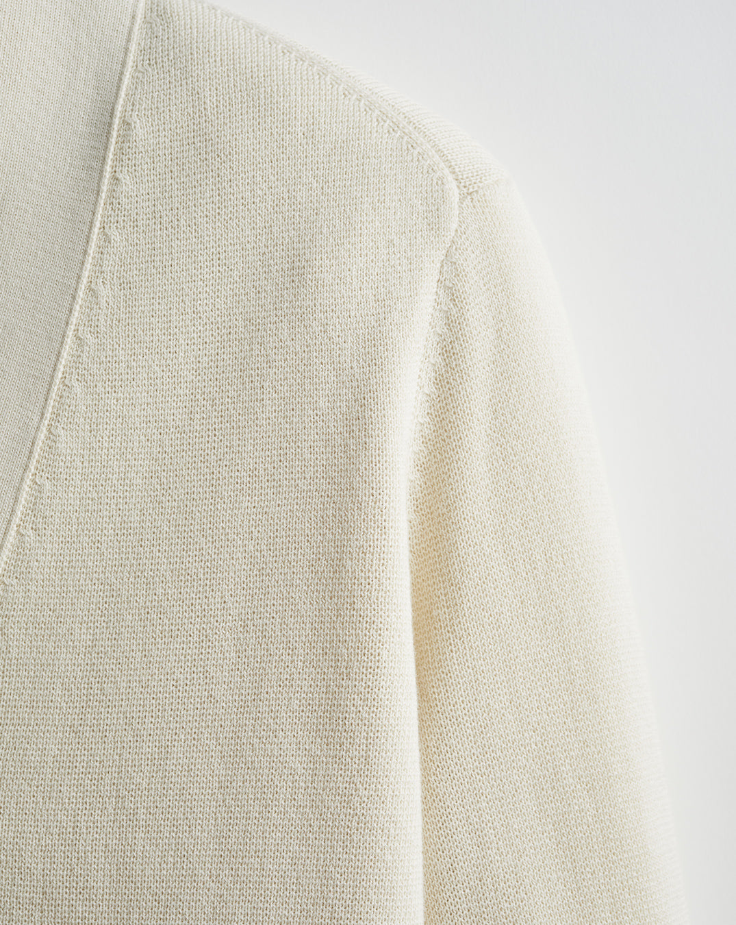 Detail shot of The Perry Cotton Cardigan in ivory — Egyptian cotton, Italian-spun