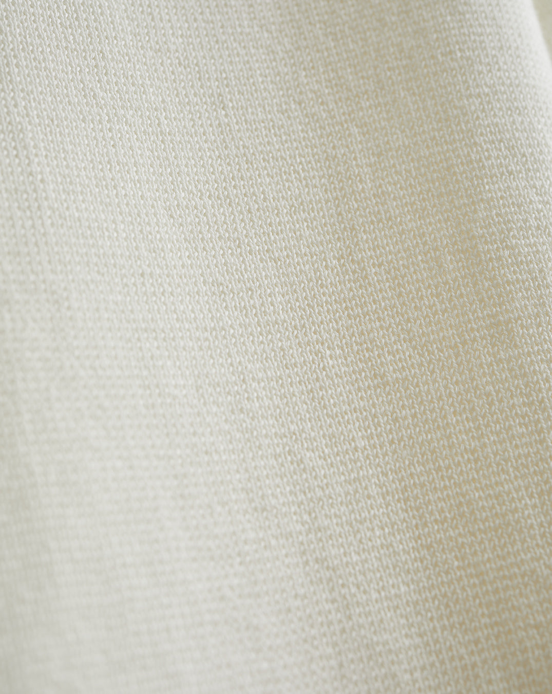Detail shot of The Perry Cotton Cardigan in eggshell — Egyptian cotton