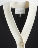 Detail shot of The Perry Tipped Cotton Cardigan in black and ivory — Egyptian cotton